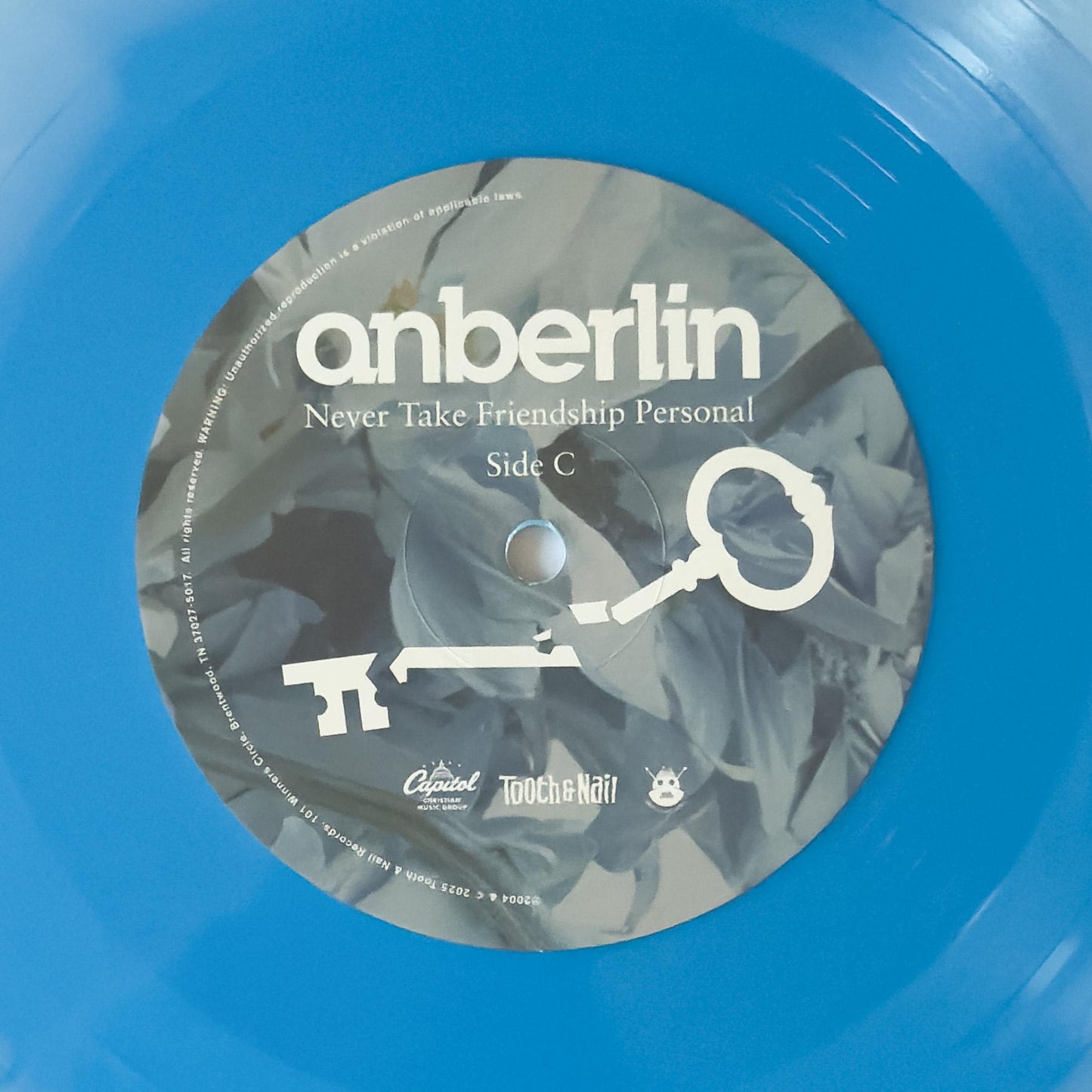 Anberlin “Never Take Friendship Personal" 2LP Vinyl Record – 2025 Deluxe 20th Anniversary Edition – Cyan/Baby Blue Vinyl